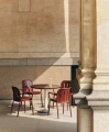 deville-armchair-iron-red_ceramic-table_910x1100.jpg