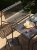 Palissade_Dining_Bench_wo_Armrest_Palissade_Chair_anthracite_Glass_Jug.jpg