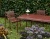 Palissade_Dining_Armchair_iron_red_Palissade_Table_L170xW90xH75_iron_red_Mousqueton_Portable_oyster_white.jpg
