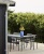 Palissade_Table_anthracite_Palissade_Dining_Armchair_anthracite_Juice_Vase_high_blue.jpg