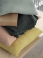 layer-cushion-sage-green-dusty-rose-yellow-rhythm-throw-dark-green-workshop-coffee-table-2-muuto-org.jpg